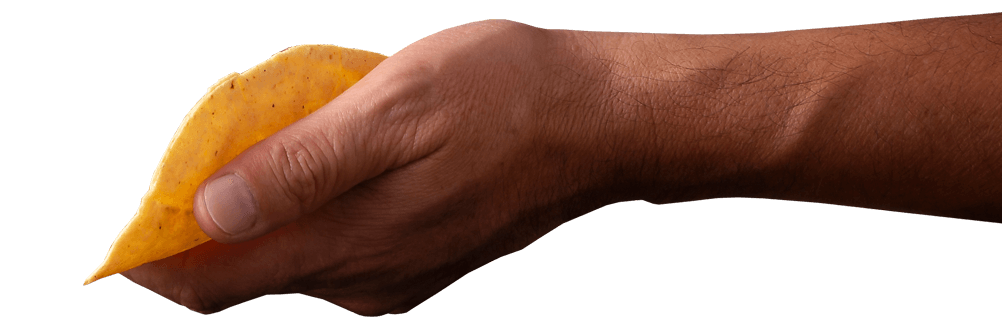 A hand reaching out with a taco shell.